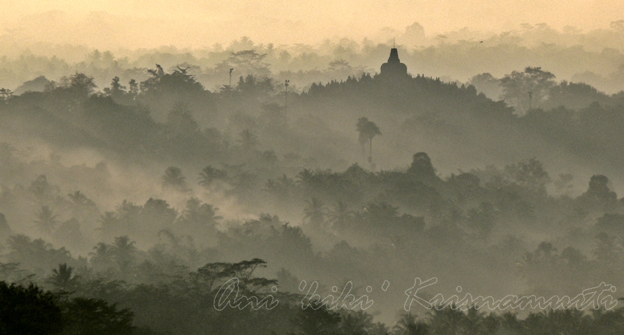 sunrise over borobudur temple, viewed from setumbu hill, magelang, central java